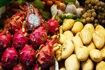 Fruit market in Thailand, mango and dragon fruit
