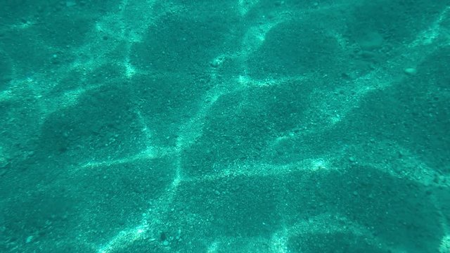 Sea Surface Shot From Underwater in Slow Motion