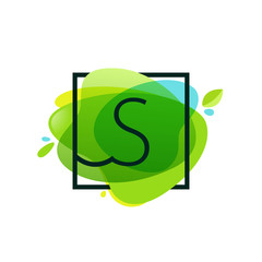 S letter logo in square frame at green watercolor splash backgro