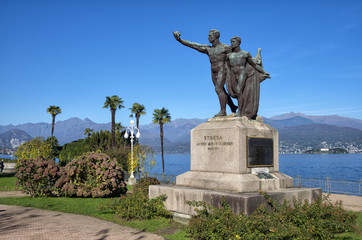 Panoramic view of Lake Maggiore with a bronze monument in memory of the fallen, Stresa, Piedmont, Italy