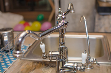 Fototapeta na wymiar Closeup of silver tap