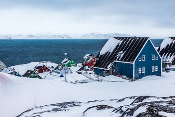 Colorful inuit houses in a suburb of arctic capital Nuuk