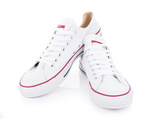 Classic white sneakers isolated on white background