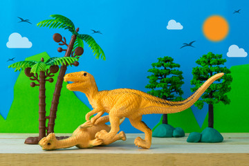 Dinosaur fight scene on wild models background © Noey smiley