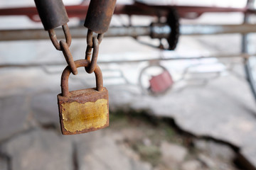 Old rusty padlock and chain.