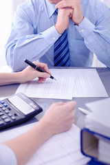 Bookkeepers or financial inspector making report, calculating or checking balance. Audit concept.