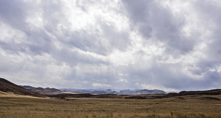 Stormy Landscape in Colorado with Mountains and Valley