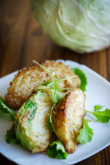 cabbage pieces fried in batter with salad