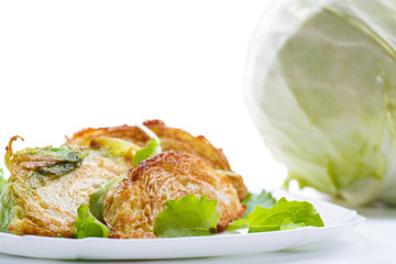 cabbage pieces fried in batter with salad