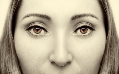 Beautiful insightful look brown woman's eyes. Vintage style