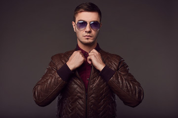 Fototapeta premium Fashion portrait of young handsome man