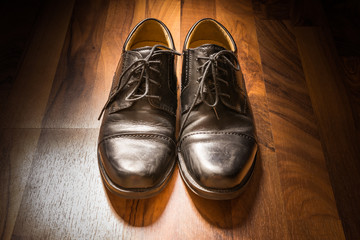 Black Leather Dress Shoes Worn Wooden Floor Sunlight Spotlight S