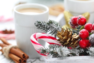 Obraz na płótnie Canvas Cup of coffee with Christmas sweetness