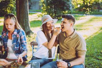Fototapeta premium Cheerful friends on picnic
