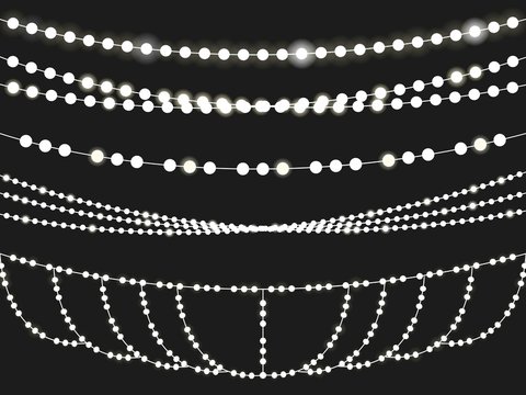 Vector Set Of Overlapping, Glowing Light Garlands Isolated On A Black Background. Christmas String Lights. EPS 10 With Transparency. Christmas Lights String . Party Lights .fairy String Lights .