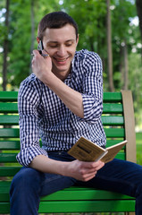 Fototapeta premium Young man using his phone