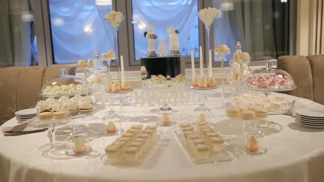 Delicious sweet desserts prepared in a good restaurant for wedding party