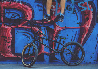 bmx near the wall.