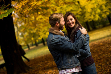 Fototapeta premium Loving couple in autumn park