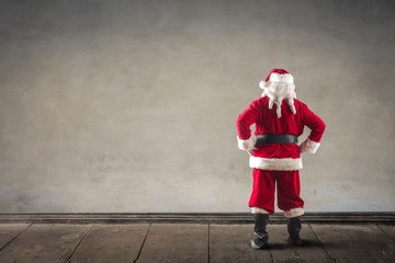 Santa Claus staring at a blank wall