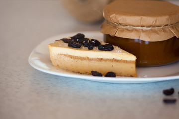 Apricot jam in the jar and cake 