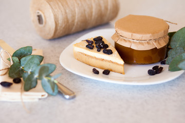 Apricot jam in the jar and cake 