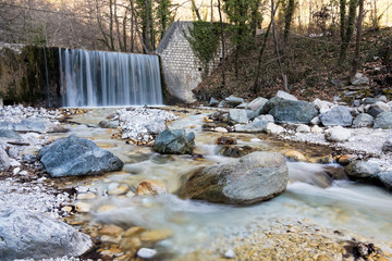 Waterfall and stream at Loutra Pozar of Aridaia in Macedonia, Greece