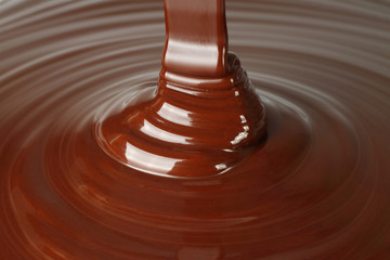 Dark chocolate flow close-up