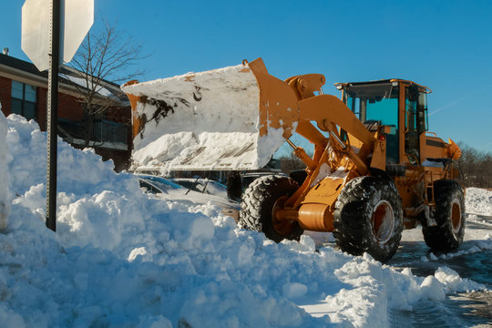 Snow removal vehicle removing 