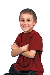 Boy confidently crossing arms and smiling
