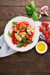 Quinoa salad with grilled vegetables, top view, rustic background