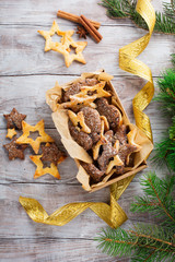 Christmas butter and chocolate cookies with festive decoration, top view