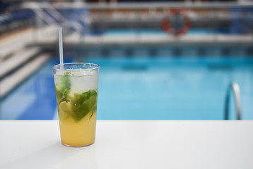 Sparkling mint lemonade at swimming pool.