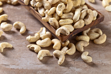 Cashews in old wooden dish