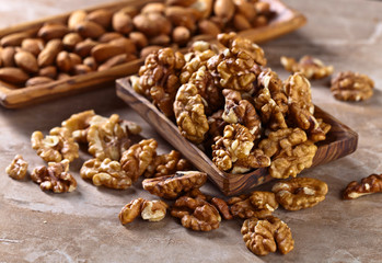 Walnuts in old wooden dish