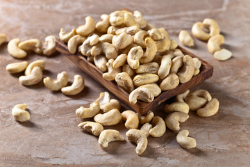 Cashews in old wooden dish