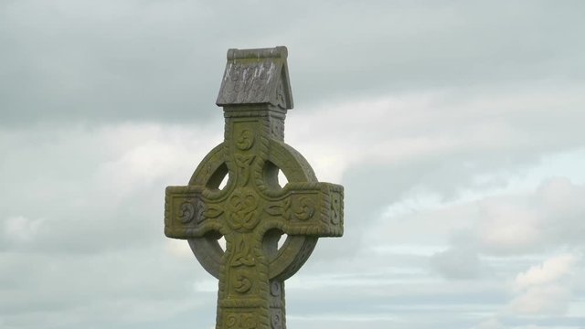 Irish high cross outside the Rock of Cashel. In the grounds around the buildings an extensive graveyard includes a number of high crosses