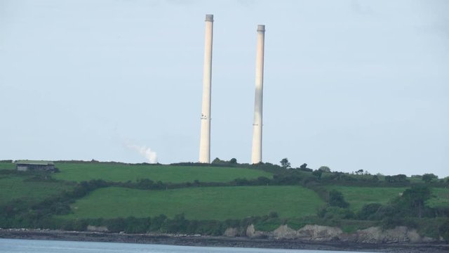 Two big lighthouses in the village of Killimer Ireland. Killimer is a village in County Clare Ireland in a civil parish of the same name