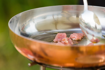 Detail of cooking meat