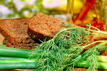 Bread and greens on a color background