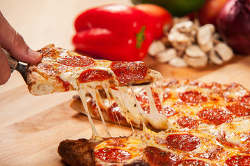 Pepperoni Pizza Cheese Pull - Food Photography - 125749749