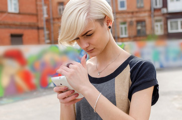 Young girl using her phone