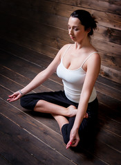 Obraz na płótnie Canvas Woman practising yoga