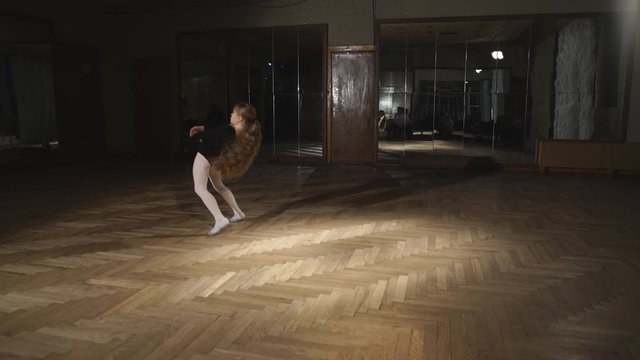 Little ballerinas dancing in dance studio