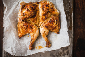 Roasted chicken. Overhead of Roasted chicken in a large roasting pan. 