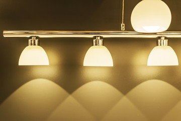 Three shades Lamps shine and give a beautiful light