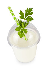 Obraz na płótnie Canvas Yogurt, kefir, smoothies, mousse in a plastic cup with a straw, with parsley. On white, isolated background.