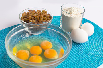 set of products for cooking muffins on the blue napkin