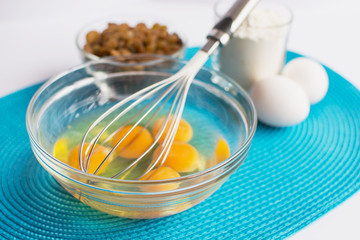 set of products for cooking muffins on the blue napkin