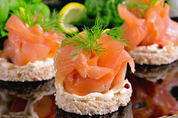 Holiday appetizer with salmon canapes